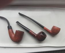 Three briar smoking pipes