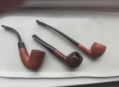 Three briar smoking pipes