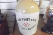 a antique john powers and son pot still whiskey stone jar