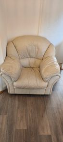 2 cream leather armchairs