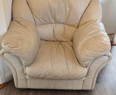 2 cream leather armchairs