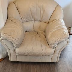 2 cream leather armchairs