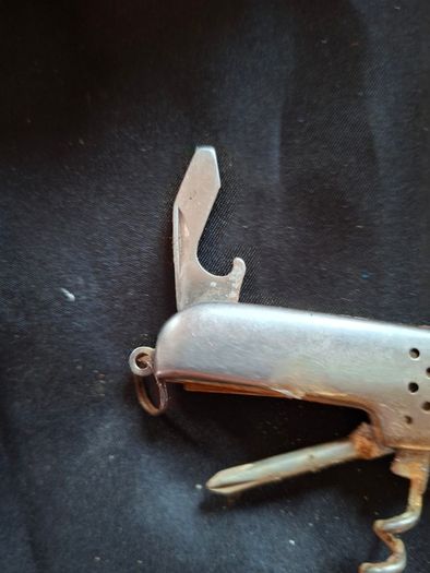Old Penknife and Steel Butterfly Comb for sale as a lot