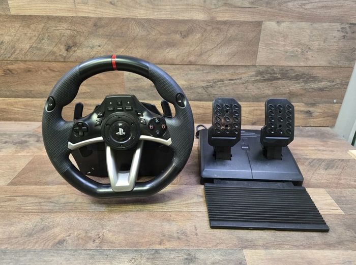 PS4 Racing Wheel Apex And Pedals. Brand New Condition  Very lightly used- maybe 6-10 times in total. Everything included.  Perfect condition with Box- PS4, PS3 And PC