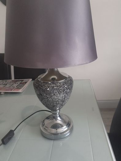 Table lamp with grey shade .Chrome and crackled glass .Can be seen working .Very modern .