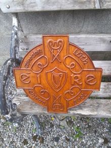 carved g.aa.a shield