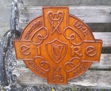 carved g.aa.a shield