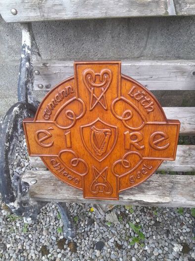 carved g.aa.a shield