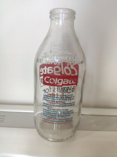 Unigate 1980s milk bottle Colgate