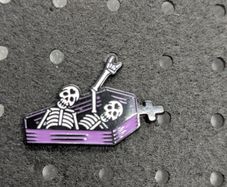 Skelton enamel pin