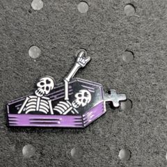 Skelton enamel pin