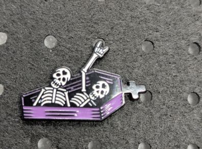 Skelton enamel pin