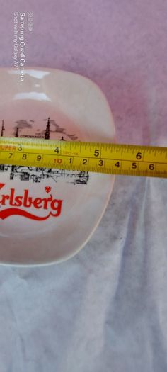 carslberg ashtray,,good condition,,pitting on glaze,,overall good, thank you, collectors item, handy for man cave, home bar etc, if buyer collects cheaper .take as is .