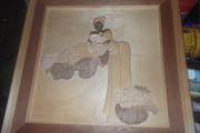 a carved wood picture