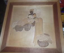 a carved wood picture