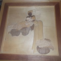 a carved wood picture
