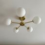 Modern 5-light brass and frosted glass ceiling fitting Image 3