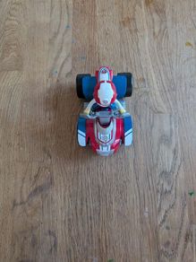 Ryder figure from paw patrol with his car