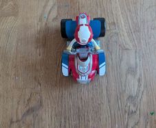 Ryder figure from paw patrol with his car