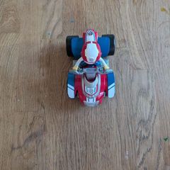 Ryder figure from paw patrol with his car