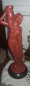 Glazed terracotta nude with water jug