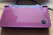 Nintendo DSi XL burgundy with Super Mario