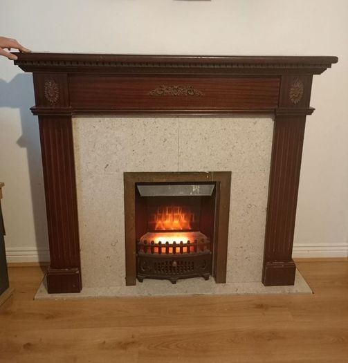 Electric fireplace and surrounds