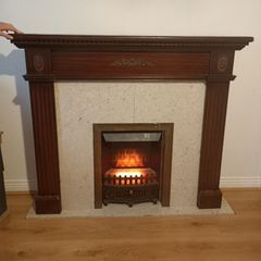 Electric fireplace and surrounds