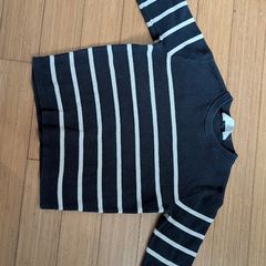 Black and white striped jumper.