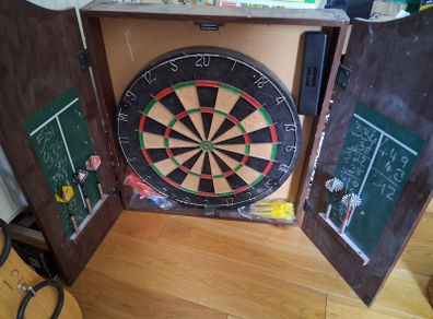 Dart Board In Cabinet