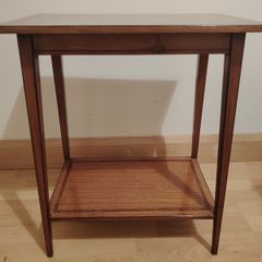 Small hardwood table with decorative inlaid border on both shelves.
