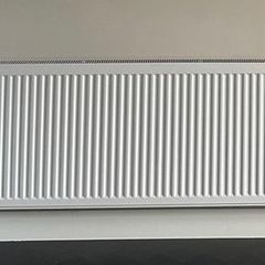 white radiator in pristine condition - 1.6 meters