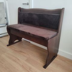 Dark wood pub bench with storage