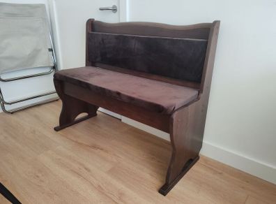 Dark wood pub bench with storage
