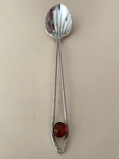 Antique coffee spoon with amber