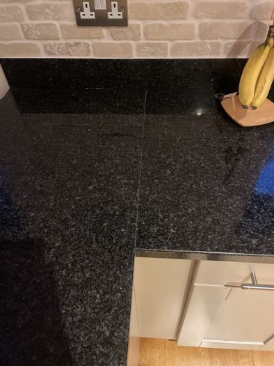 Entire kitchen Quartz work top solid wooden shaker style doors