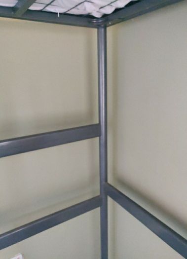 Over desk single bed.