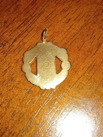 Gold pendant Manchester United