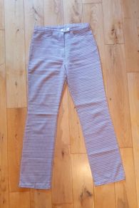 Trousers with 'flare' effect