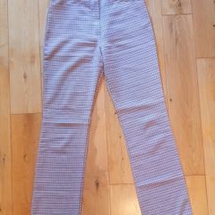 Trousers with 'flare' effect