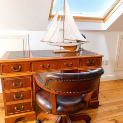 Mahogany Leather Top Partners Desk and Brown Chesterfield Captain's Chair