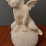 Lovely Vintage Pair of Ceramic Baby Winged Angels Sitting on Globes with a Very Tactile Cream Coloured Crackle Glaze Image 10