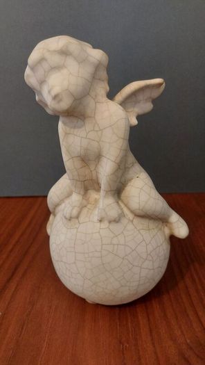 Lovely Vintage Pair of Ceramic Baby Winged Angels Sitting on Globes with a Very Tactile Cream Coloured Crackle Glaze