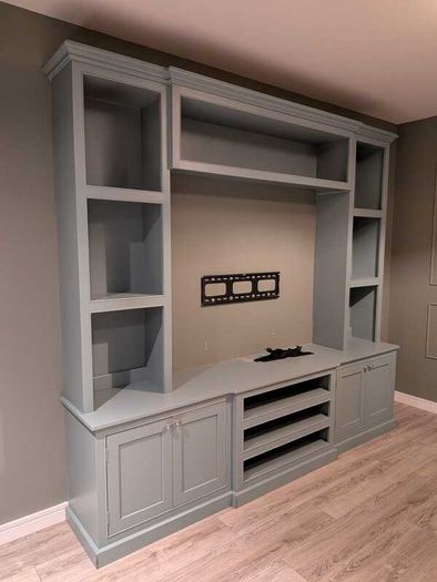Large custom-built fitted media wall / TV unit in very good used condition.
