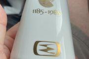Cork historical itemDesign Features: White fine bone china with gold trim, a triquetra/Celtic knot- style top finial, the official "Cork 800" gold graphic with the city crest, and the prominent "1185-1985" date marker. ,  vintage Royal Tara memorabilia Hi