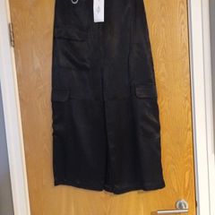 Stradivarius  Black Silk  Look Skirt.  S.M - 12.    B.N.W.T