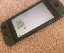 NINTENDO SWITCH with animal crossing and super mario odyssey