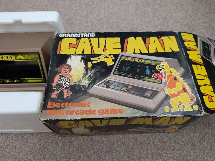 Grandstand Cave man handheld for repair