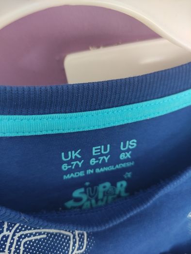 Astronaut style top barely used 6/7 years PRICE 8 EURO