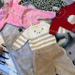 Baby bundles clothes and blankets